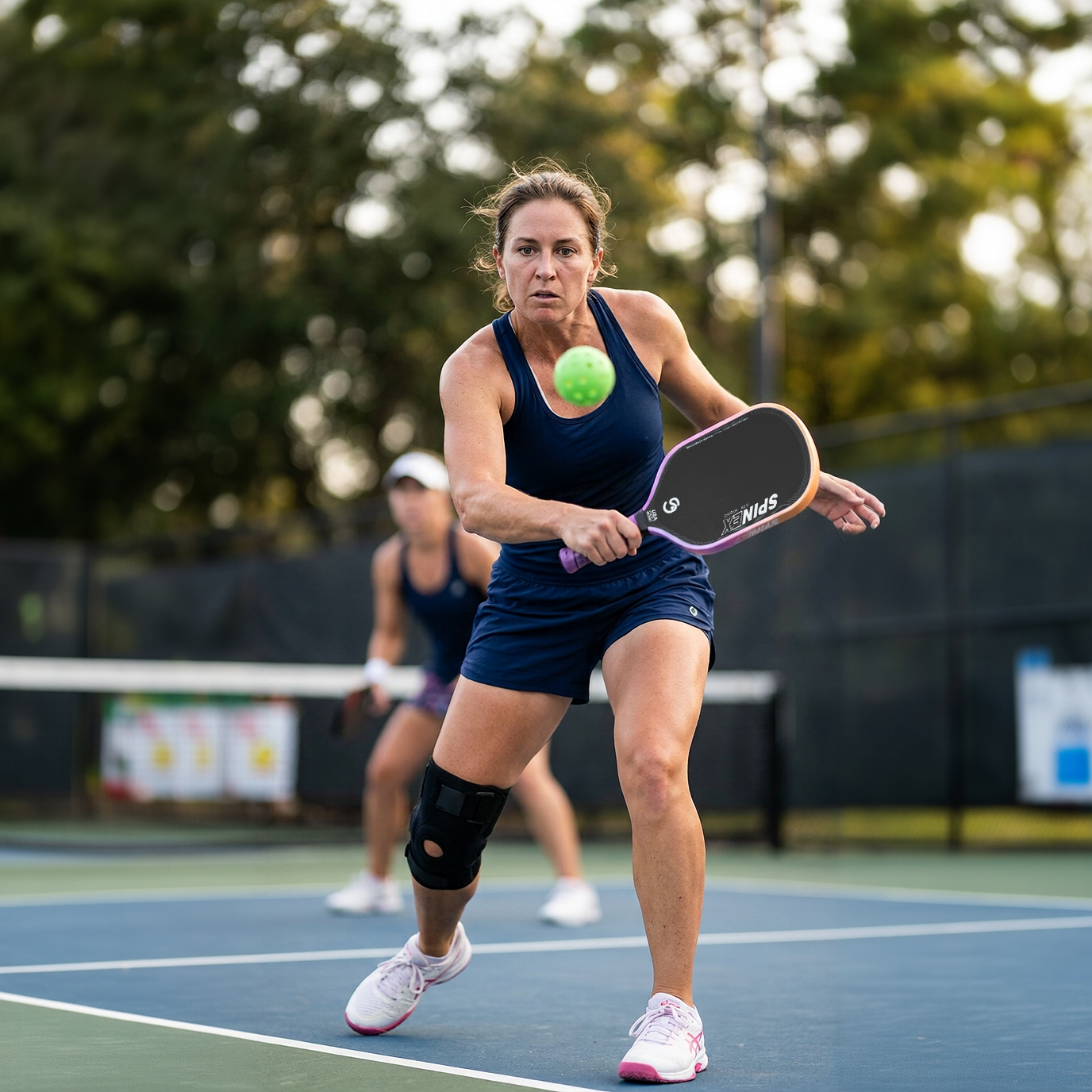 Pickleball players in action on court — Spinex Pickleball designed in Australia